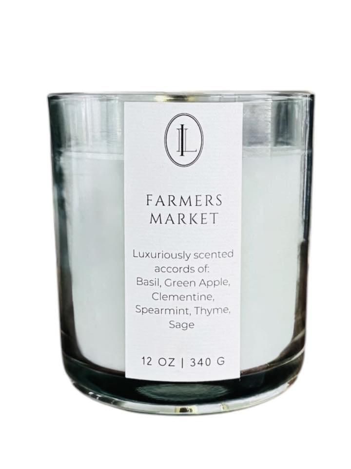 Luxe Intuition Farmers Market candle - basil, clementine and sage in a green glass vessel 