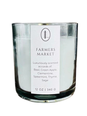 Luxe Intuition Farmers Market candle - basil, clementine and sage in a green glass vessel 