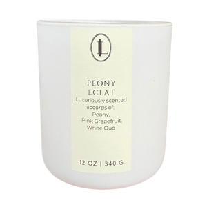 Peony Eclat candle in matte white frosted 12oz vessel with peony, pink grapefruit, and white oud notes — Luxe Intuition