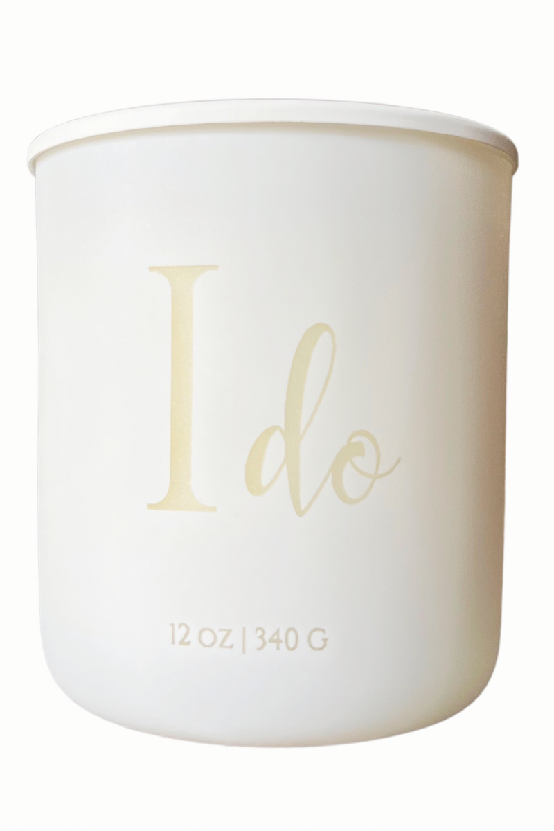 Wick & Bloom "I Do" wedding candle with etched script on a matte white vessel
