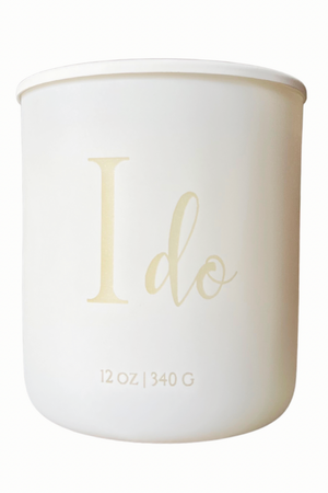 Wick & Bloom "I Do" wedding candle with etched script on a matte white vessel