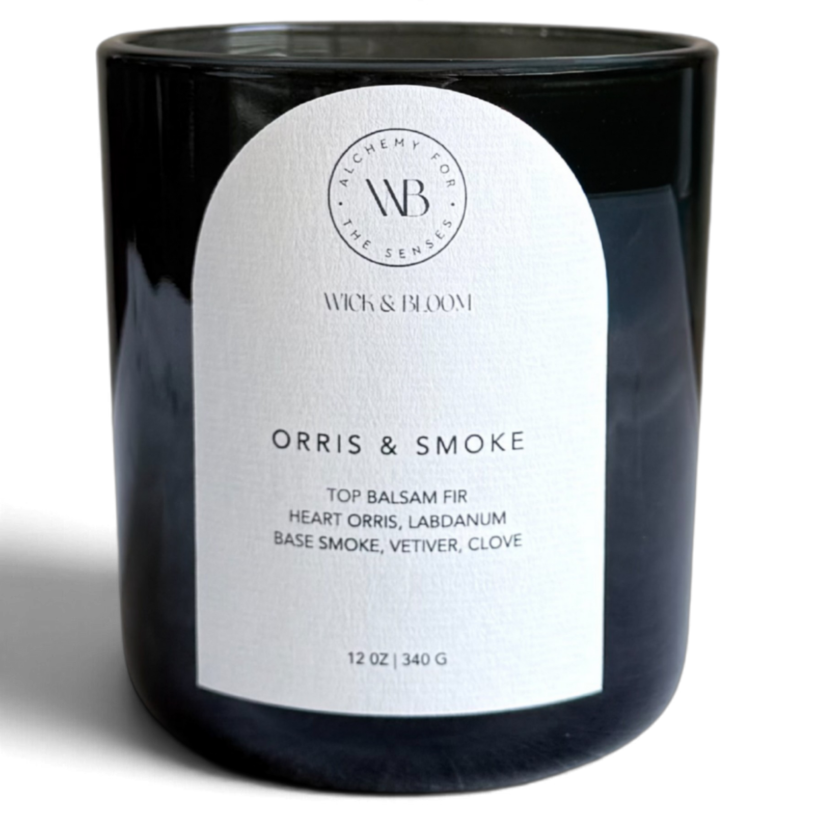 Wick & Bloom Orris & Smoke candle balsam fir, orris and smoke in a translucent black glass vessel